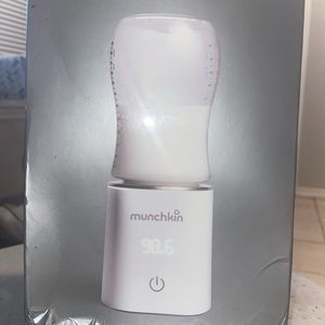 Munchkin baby gital bottle warmer 25 obo good conditions